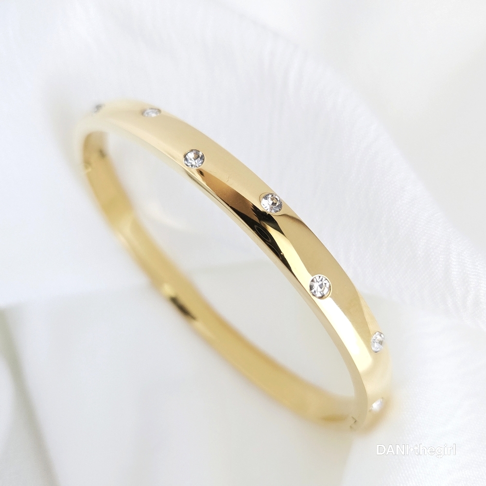 Gold Spaced Zirconia Bangle Bracelet